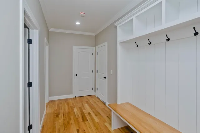 a view of room with wooden floor