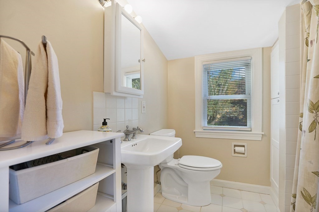 49 Marchioness Road Springfield, MA 01129 - Photo 19 of 35 a bathroom with a sink toilet and mirror