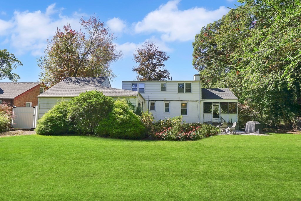 49 Marchioness Road Springfield, MA 01129 - Photo 2 of 35 a front view of a house with a garden