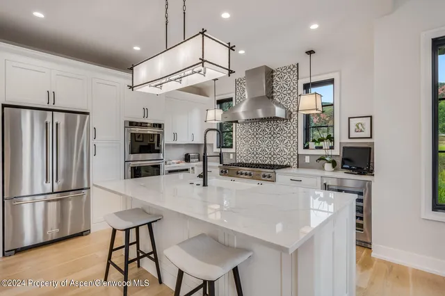 a bathroom with a sink and toilet
