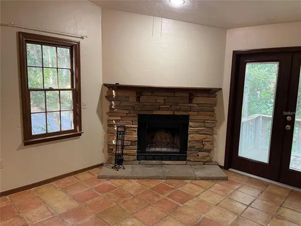 a view of livingroom with an empty space and window