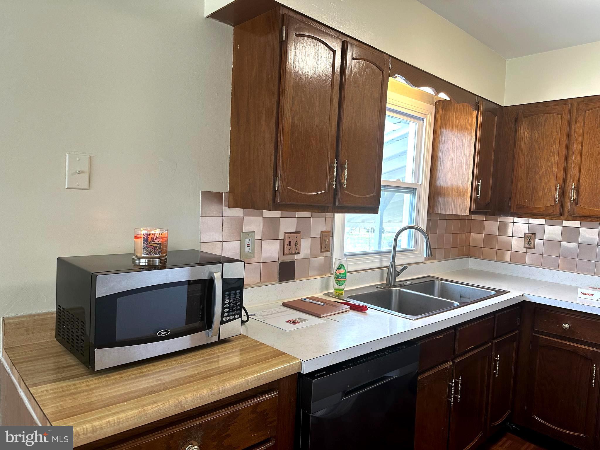 814 North Reymann Street Ranson, WV 25438 - Photo 4 of 19 a kitchen with a sink and cabinets