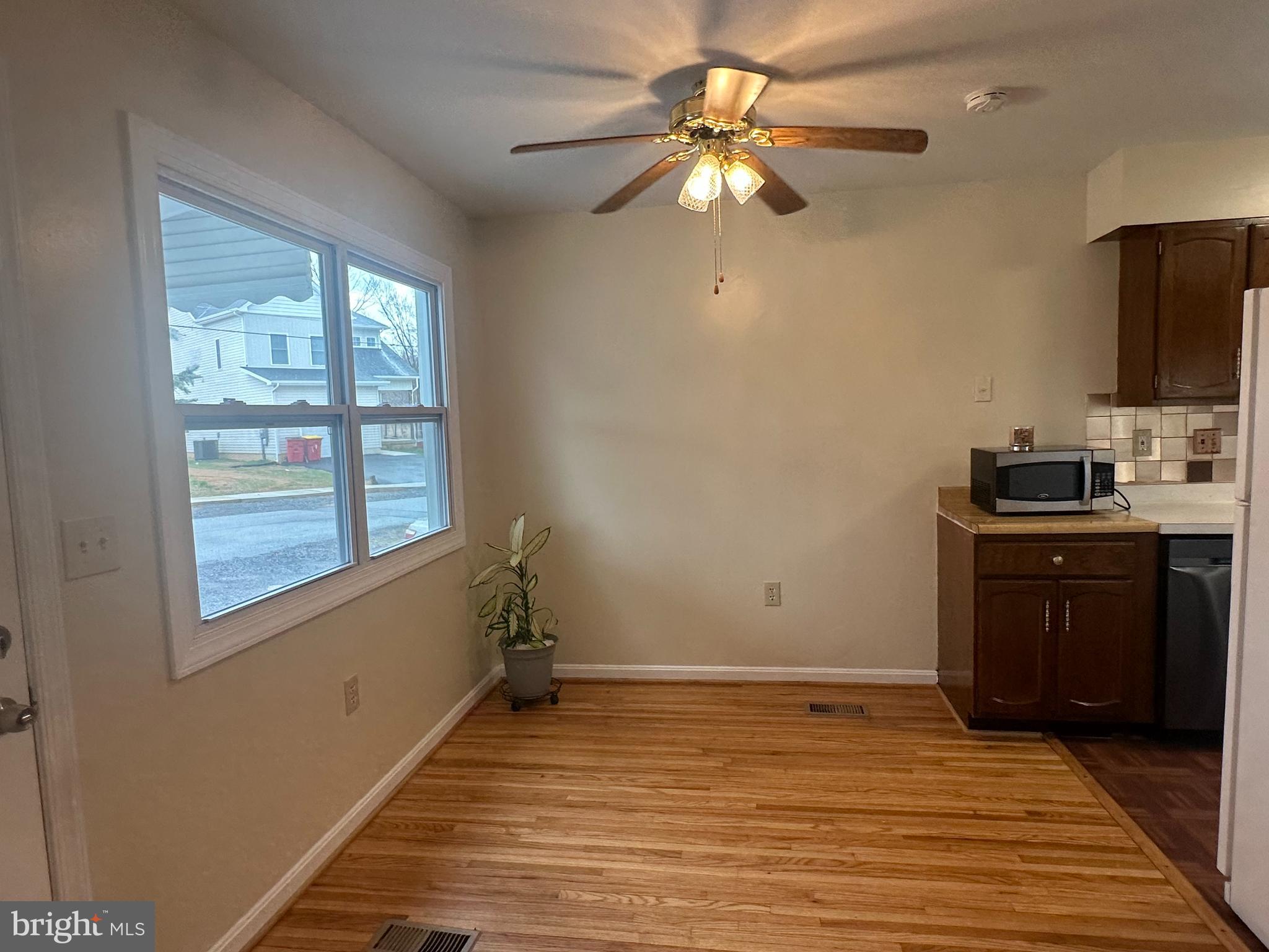 814 North Reymann Street Ranson, WV 25438 - Photo 5 of 19 a view of a livingroom with a flat screen tv