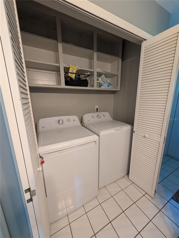 1675 Judith Drive, Unit A Kissimmee, FL 34758 - Photo 11 of 24 a utility room with dryer and washer