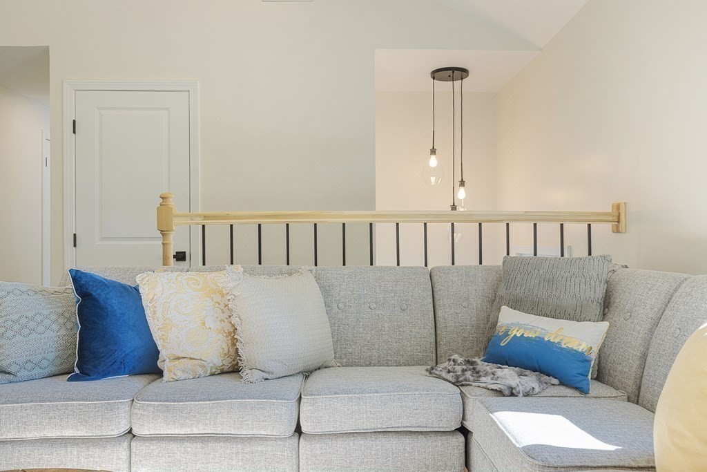 45 Revere Road Woburn, MA 01801 - Photo 15 of 32 a living room with a couch