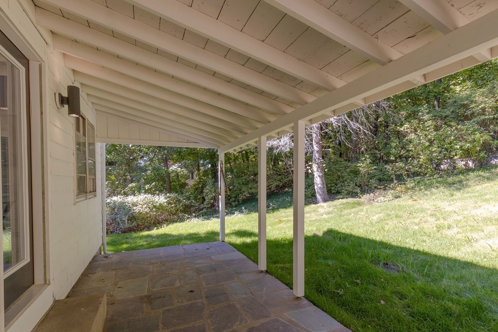 45 Revere Road Woburn, MA 01801 - Photo 28 of 32 a view of a porch and garden