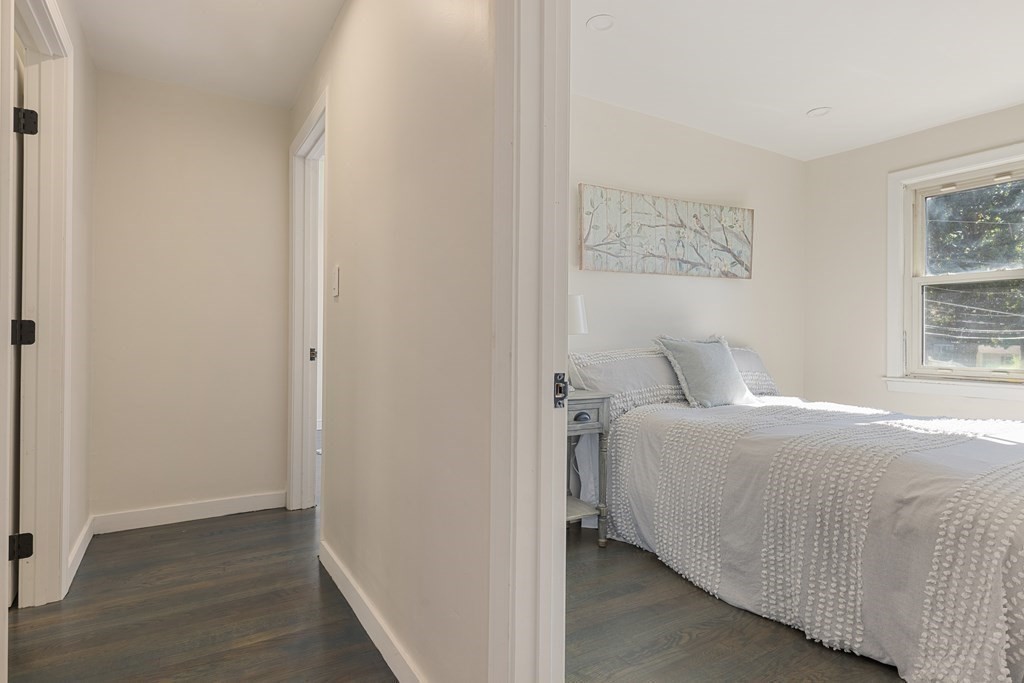 45 Revere Road Woburn, MA 01801 - Photo 4 of 32 a bedroom with a bed and a window