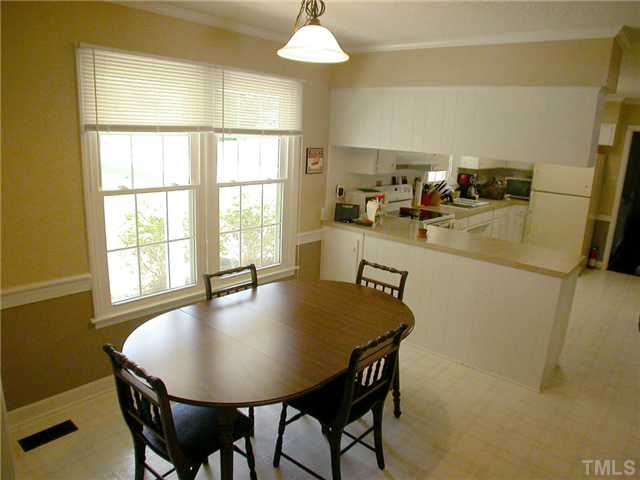 11708 Trottenham Street Raleigh, NC 27614 - Photo 5 of 22 Breakfast room on the front of the home open to the kitchen and great room to the right.