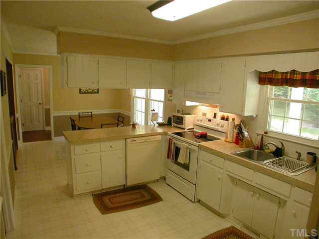 11708 Trottenham Street Raleigh, NC 27614 - Photo 7 of 22 Another view of the kitchen showing the dish washer and breakfast room.