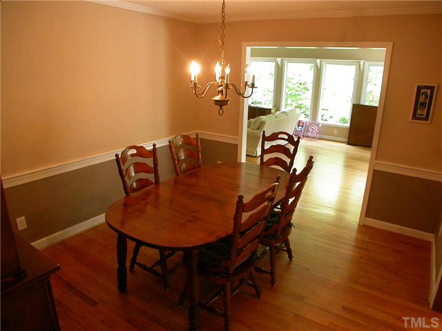 11708 Trottenham Street Raleigh, NC 27614 - Photo 9 of 22 Another view of the dining room showing the opening to the sunroom.