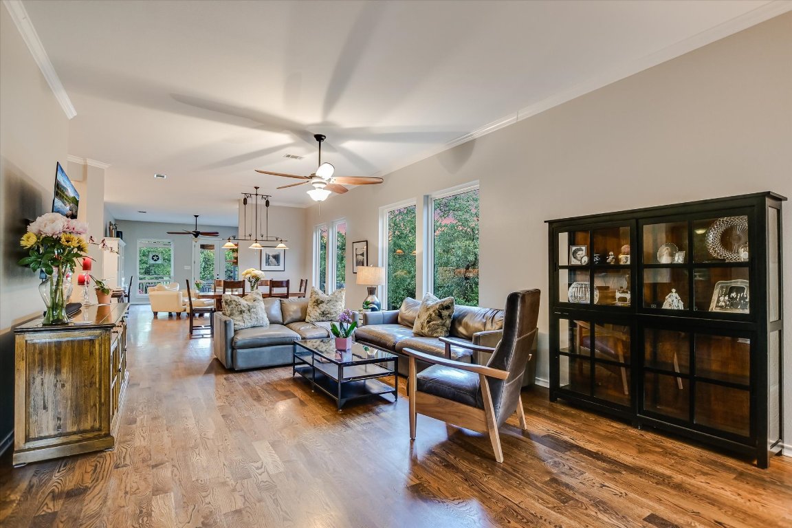 5507 Mt Bonnell Road Austin, TX 78731 - Photo 10 of 35 a living room with furniture and a book shelf