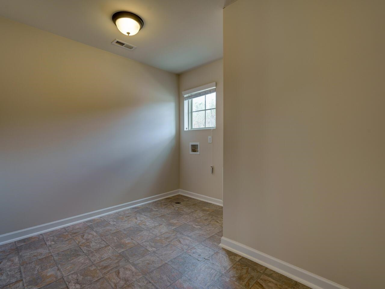 8167 Feldwig Place Raleigh, NC 27616 - Photo 33 of 51 2nd Floor Laundry/Utility Room