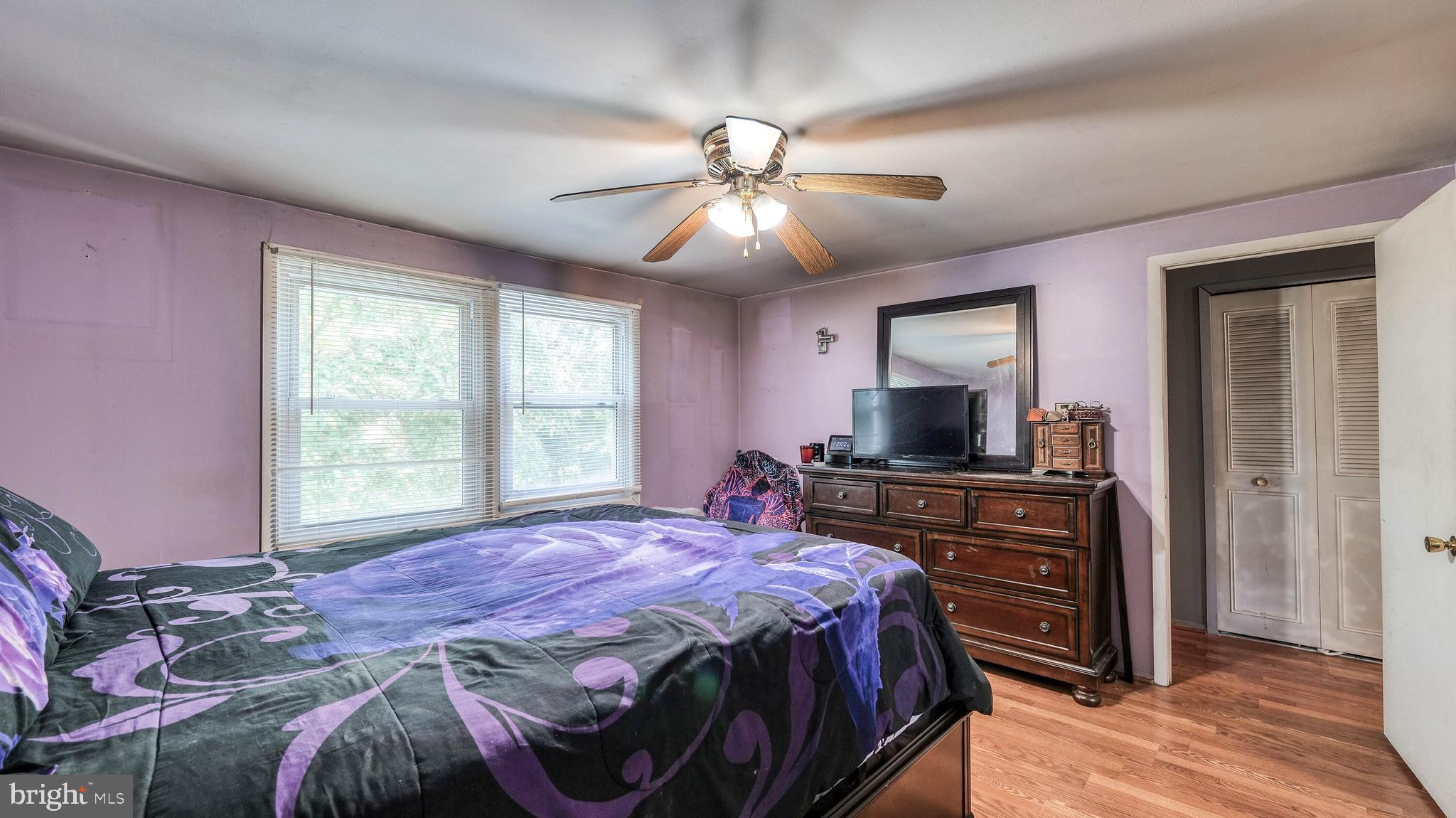 9 Ridgewood Place Willingboro, NJ 08046 - Photo 16 of 19 a bedroom with a bed and a flat screen tv