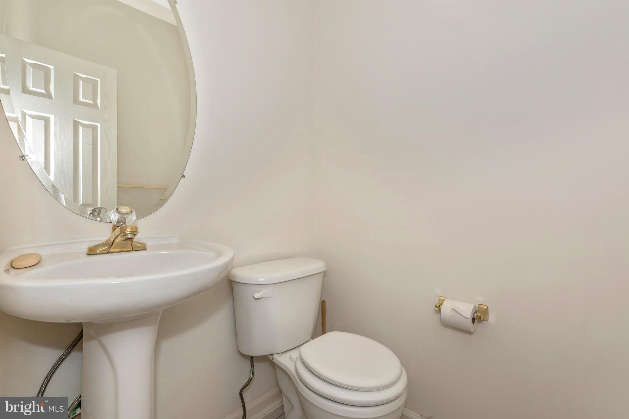 18034 Rockingham Place Germantown, MD 20874 - Photo 24 of 38 Main level half bath