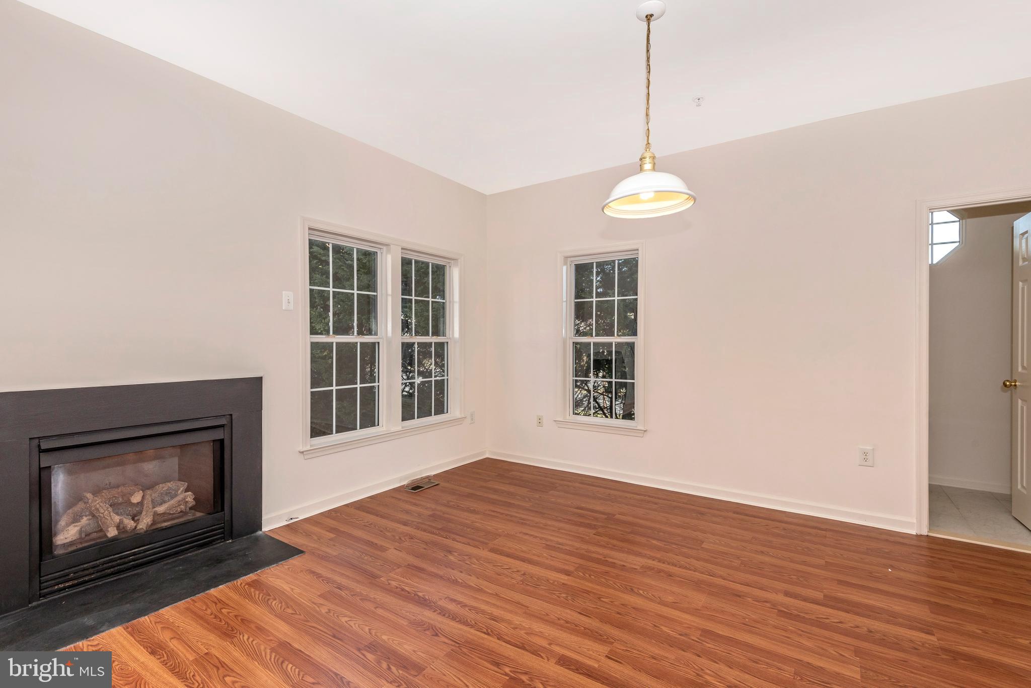18034 Rockingham Place Germantown, MD 20874 - Photo 10 of 38 Family room off kitchen with gas FP