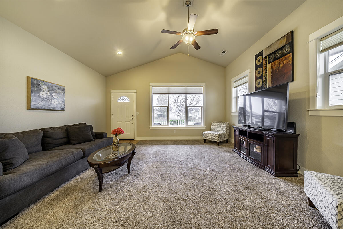 1078 North Haskell Street Central Point, OR 97502 - Photo 6 of 25 a living room with furniture and a window