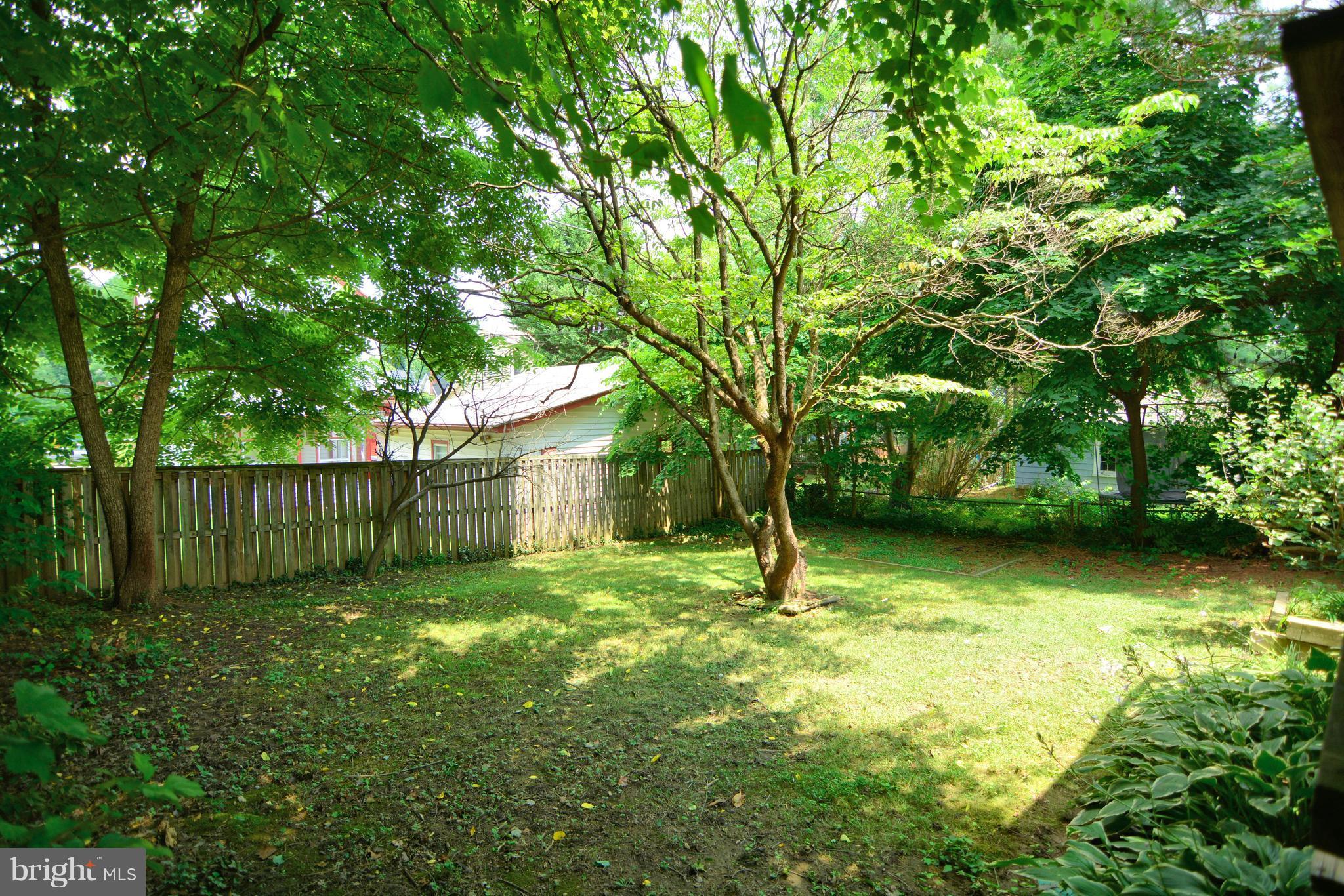 614 Dunkirk Road Baltimore, MD 21212 - Photo 22 of 30 Large level lot with mature trees and fenced yard