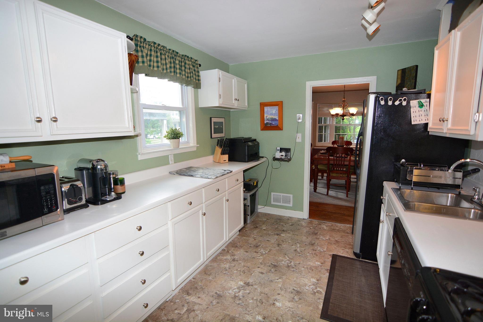 614 Dunkirk Road Baltimore, MD 21212 - Photo 5 of 30 Updated kitchen with stainless refrigerator