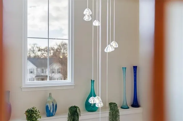 a bedroom with bed and window