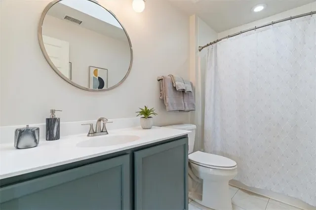 a view of a dining room furniture and a chandelier