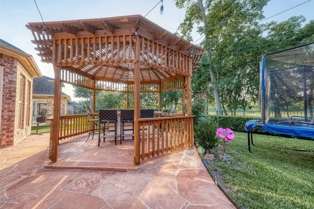 a view of a chairs and tables in the patio