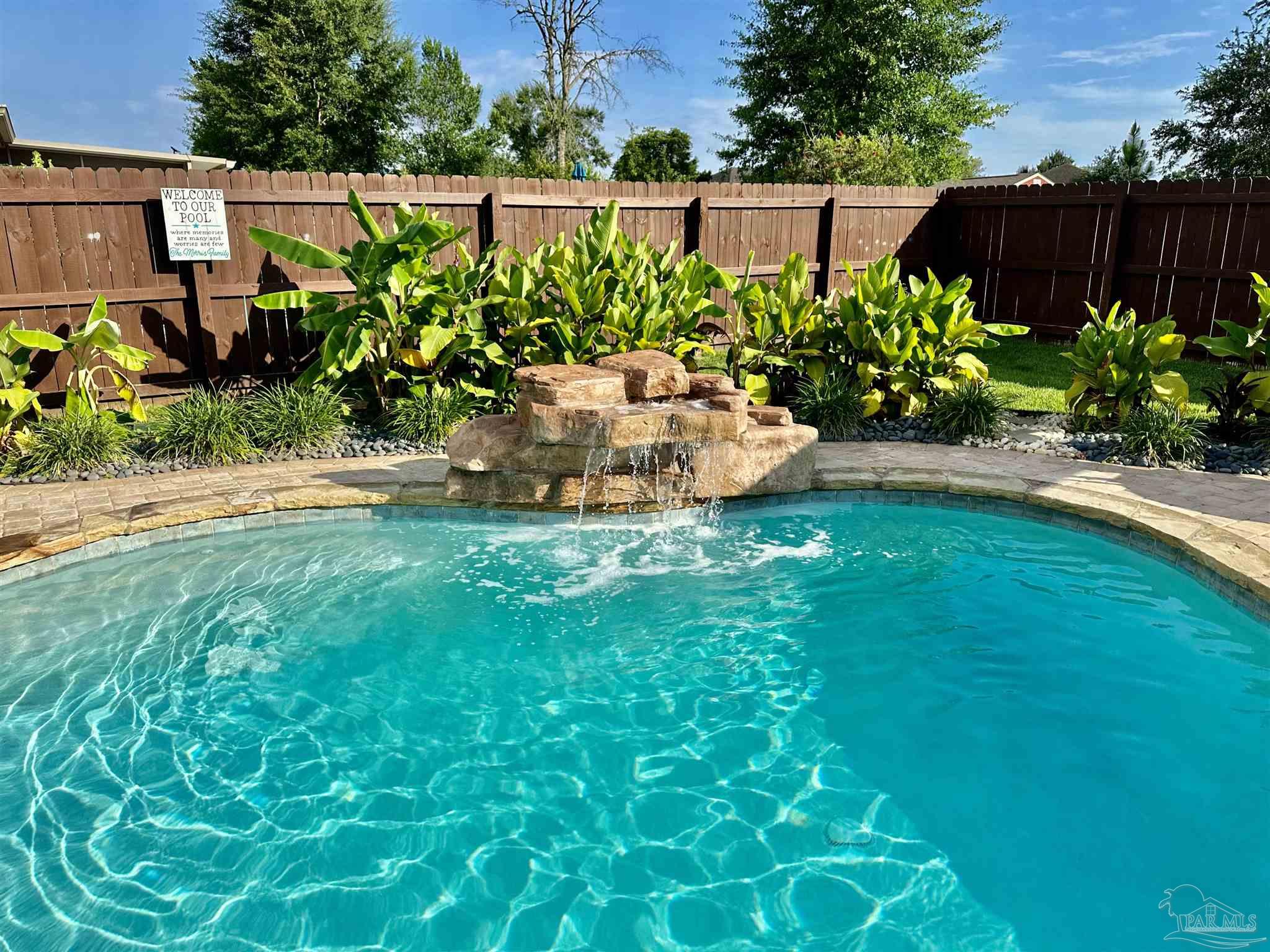 1700 Kahuna Way Cantonment, FL 32533 - Photo 11 of 34 a view of a garden with plants