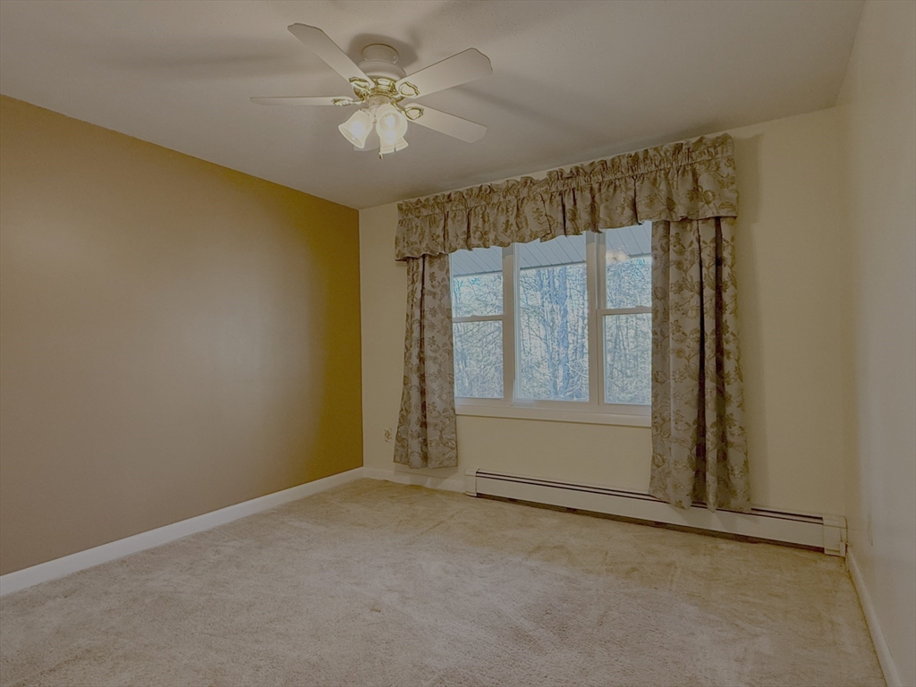 3 Tanager Road Goffstown, NH 03045 - Photo 16 of 35 an empty room with a window