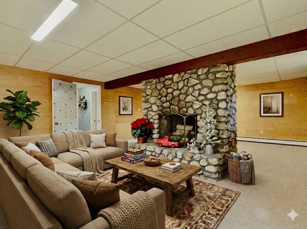 3 Tanager Road Goffstown, NH 03045 - Photo 25 of 35 a living room with furniture and a potted plant