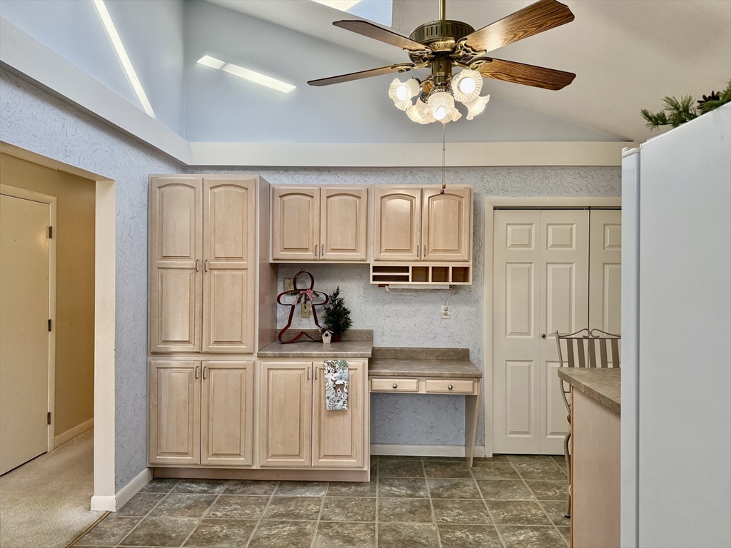 3 Tanager Road Goffstown, NH 03045 - Photo 6 of 35 a kitchen with stainless steel appliances a refrigerator sink and cabinets