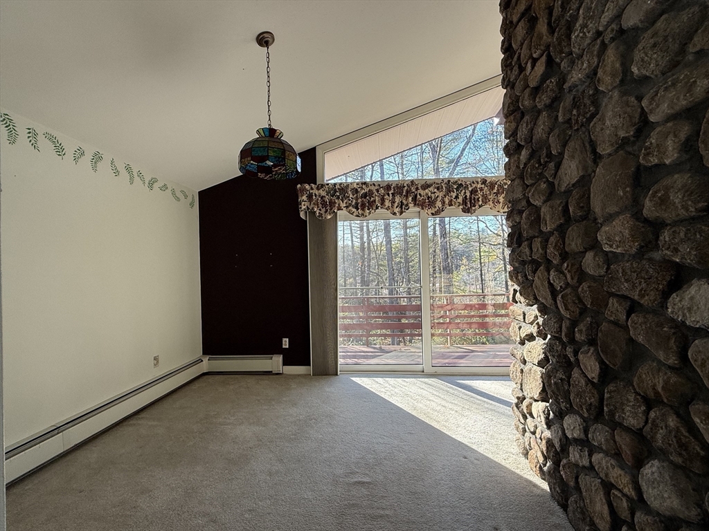 3 Tanager Road Goffstown, NH 03045 - Photo 10 of 35 a view of a room with a flat screen tv