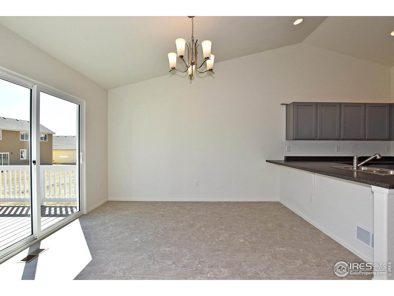 2335 Sublime Drive Windsor, CO 80550 - Photo 14 of 39 a view of kitchen with furniture and a window