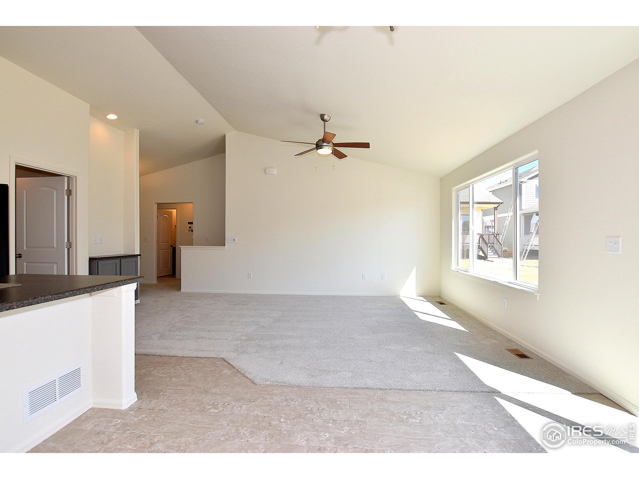 2335 Sublime Drive Windsor, CO 80550 - Photo 16 of 39 a view of a living room with a window