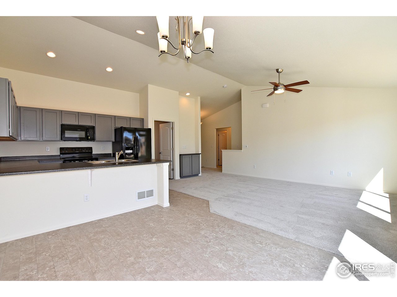 2335 Sublime Drive Windsor, CO 80550 - Photo 18 of 39 a view of a kitchen with stainless steel appliances a sink