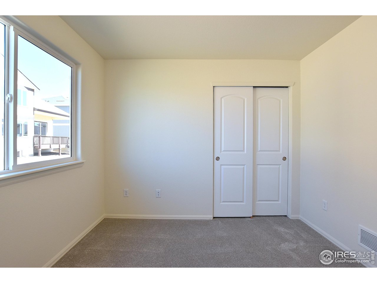 2335 Sublime Drive Windsor, CO 80550 - Photo 29 of 39 a view of an empty room and window