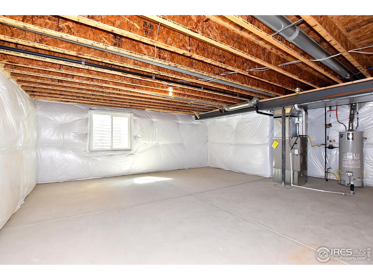 2335 Sublime Drive Windsor, CO 80550 - Photo 36 of 39 a view of empty room with wooden floor
