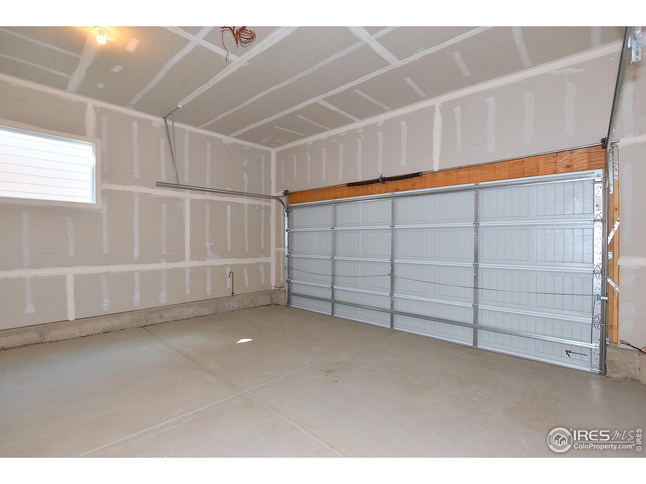 2335 Sublime Drive Windsor, CO 80550 - Photo 37 of 39 a view of a garage