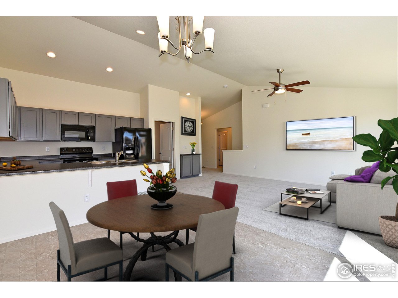2335 Sublime Drive Windsor, CO 80550 - Photo 9 of 39 a view of a dining room with furniture and wooden floor
