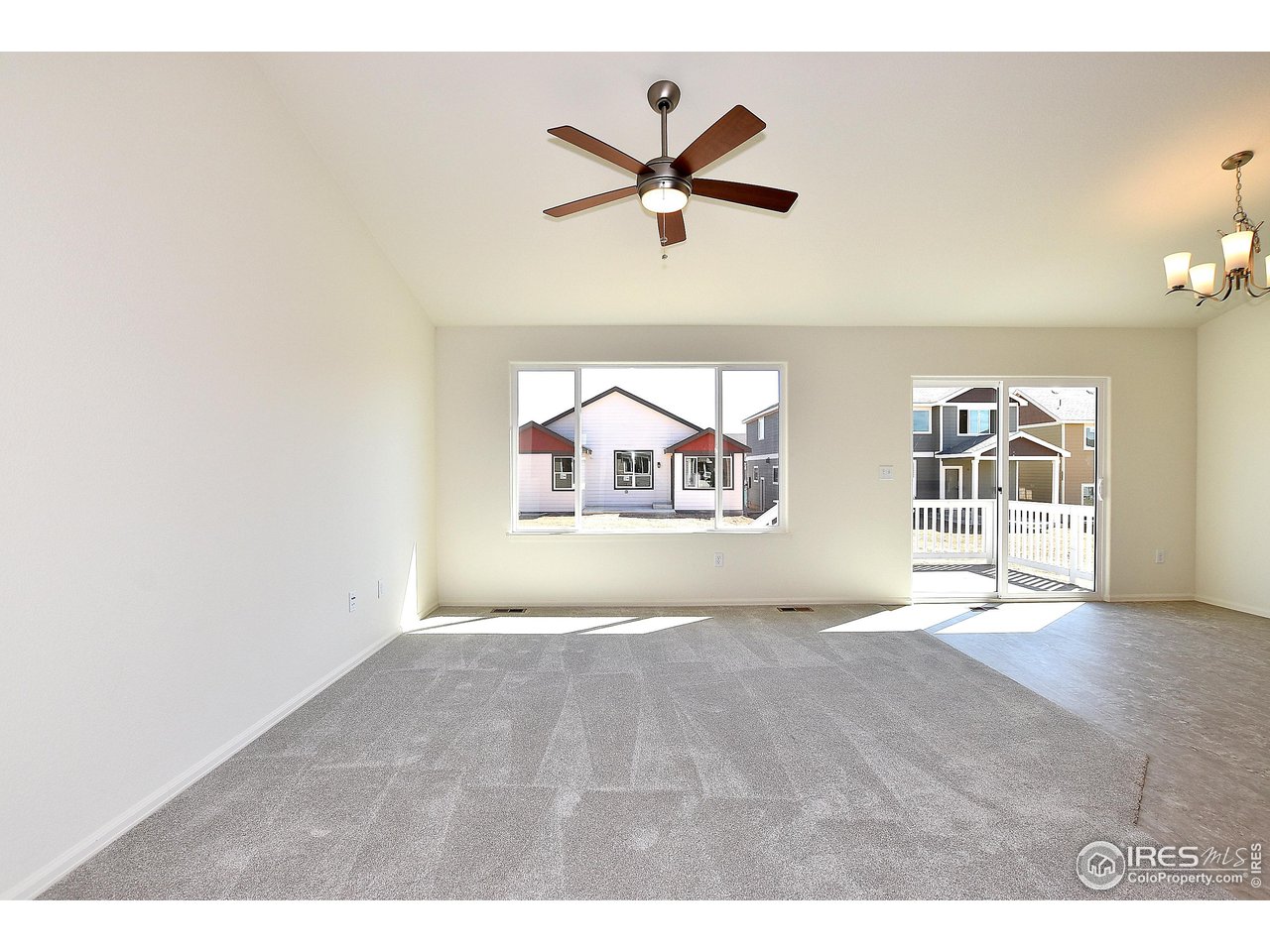 2335 Sublime Drive Windsor, CO 80550 - Photo 10 of 39 a view of an empty room with a window