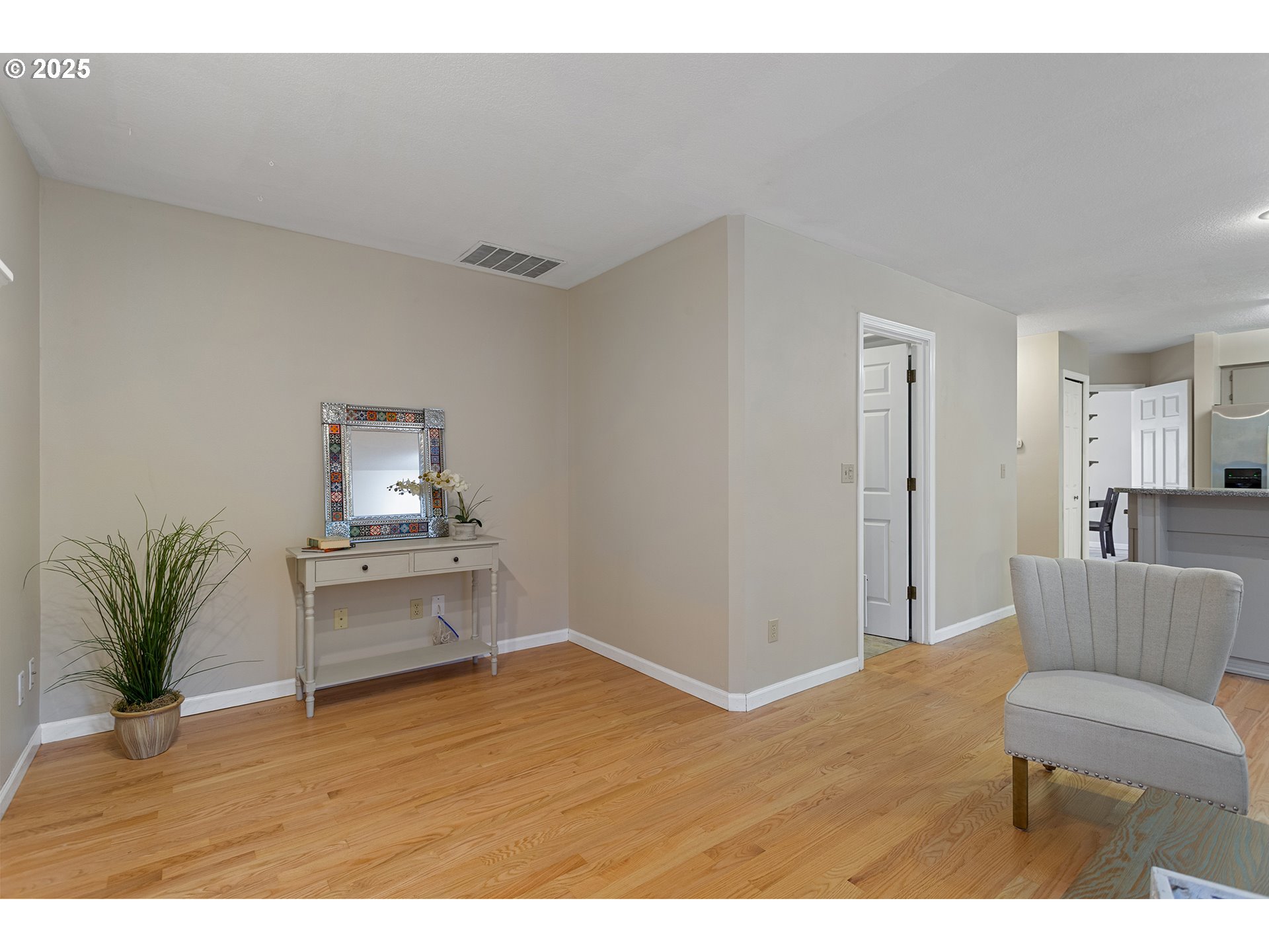 9125 Southwest Davies Road Beaverton, OR 97008 - Photo 18 of 44 a living room with furniture and wooden floor