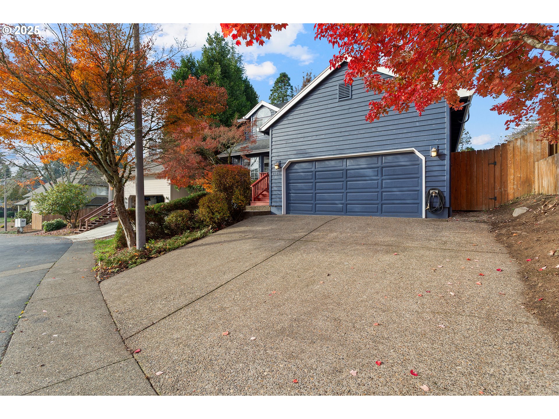 9125 Southwest Davies Road Beaverton, OR 97008 - Photo 2 of 44 a view of a house with a street
