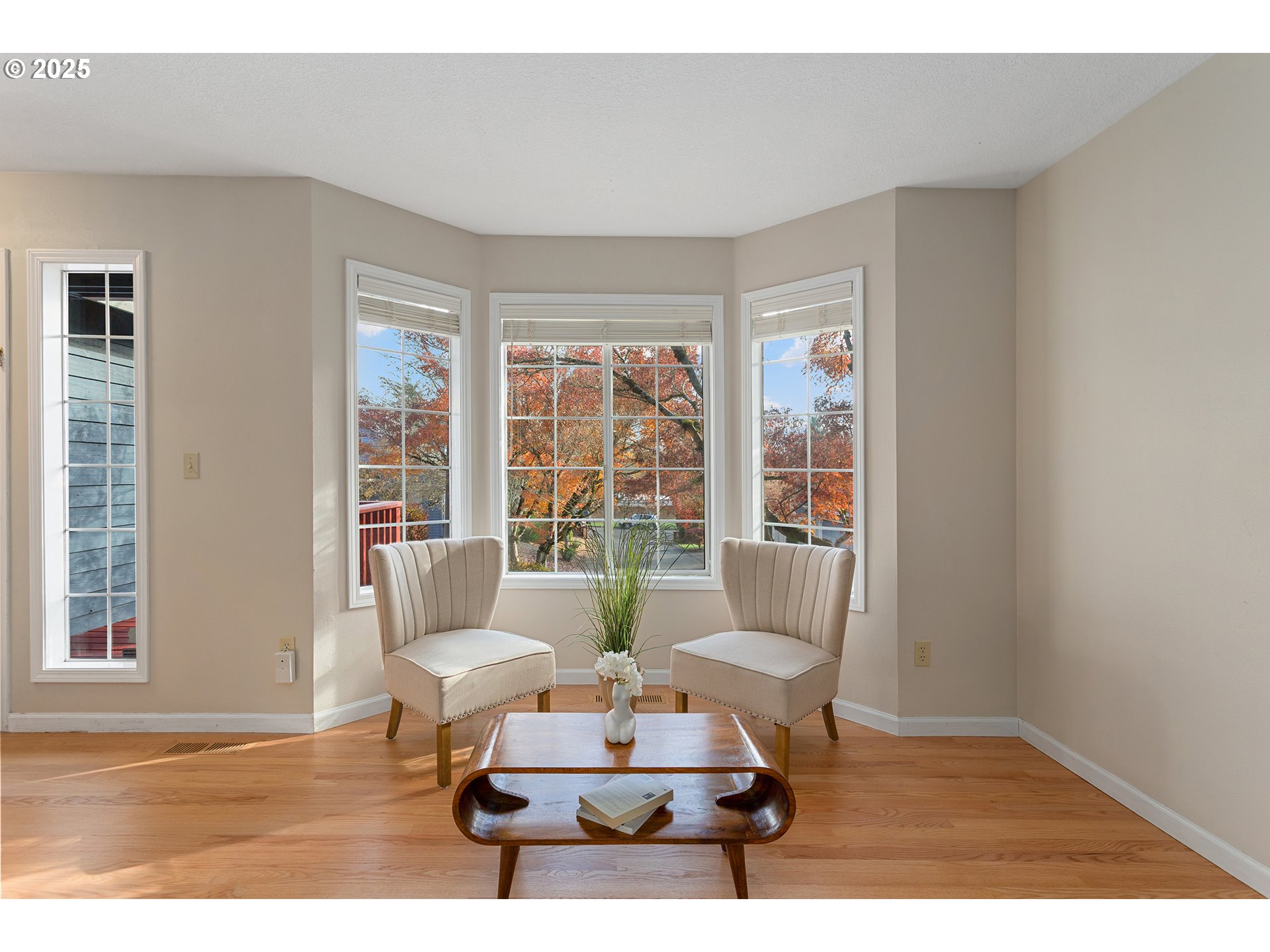 9125 Southwest Davies Road Beaverton, OR 97008 - Photo 6 of 44 a living room with furniture and a large window