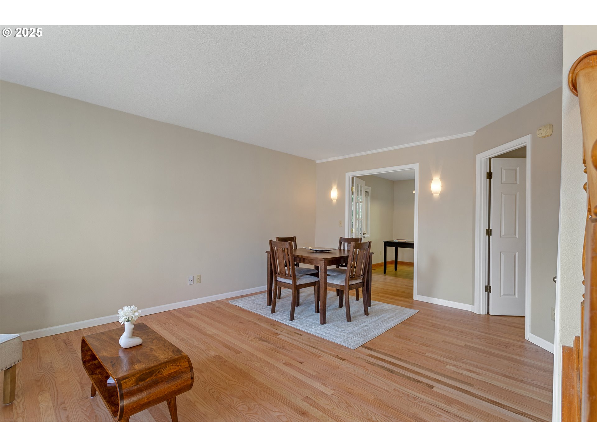 9125 Southwest Davies Road Beaverton, OR 97008 - Photo 8 of 44 a dining room with furniture and wooden floor