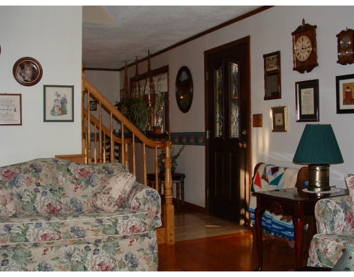 373 Main Street Rutland, MA 01543 - Photo 3 of 18 a living room with furniture and a rug