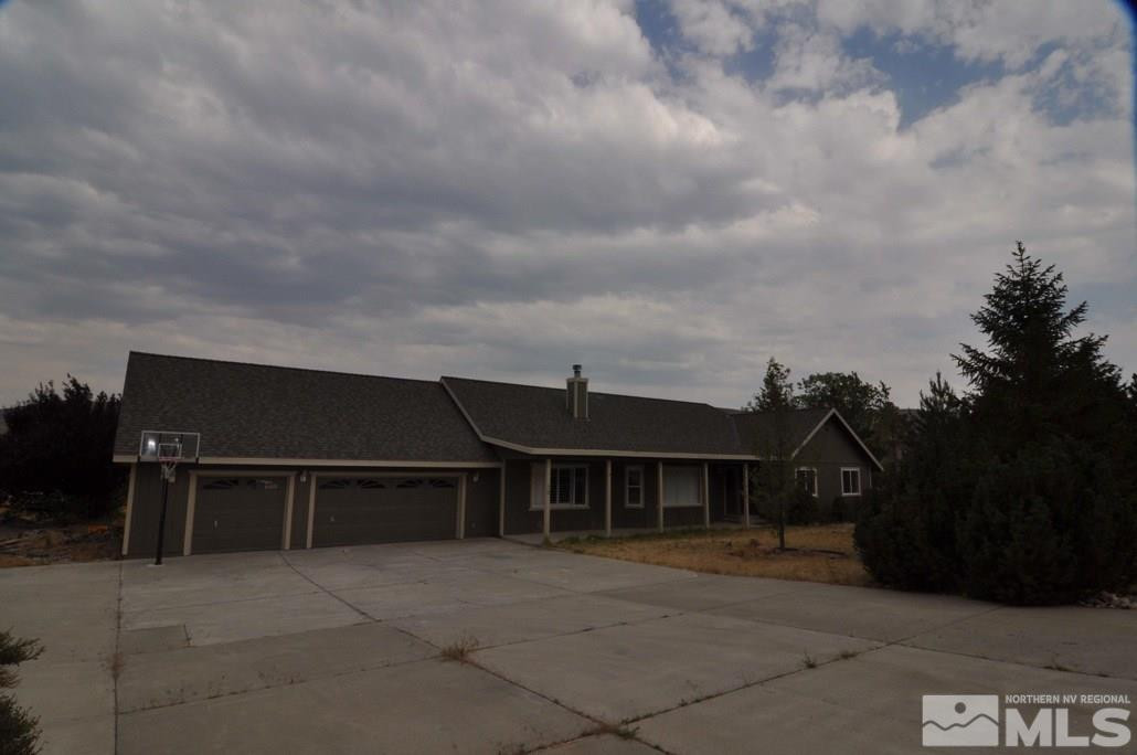 10 Sunbeam Court Reno, NV 89521 - Photo 1 of 1 a front view of a house with a yard