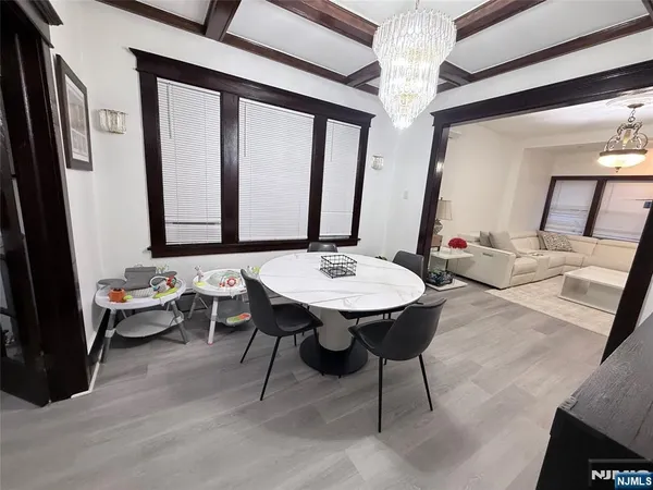 a view of a livingroom with furniture and window