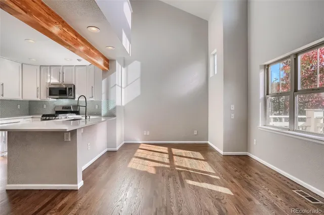 a view of a street with buildings in the background