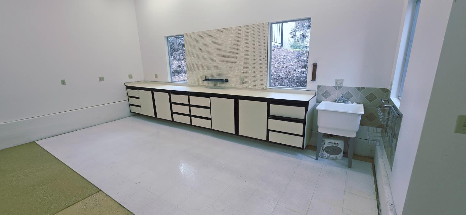 9738 Rim Rock Circle Loomis, CA 95650 - Photo 83 of 94 The Workshop offers abundant workspace plus sink.