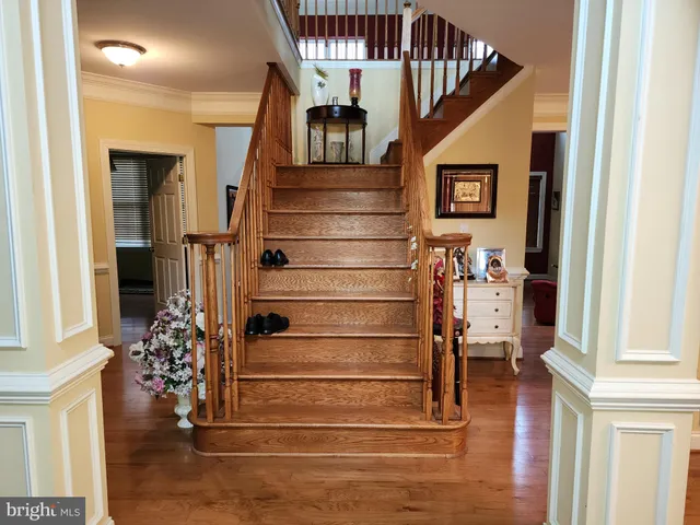 a view of entryway with wooden door