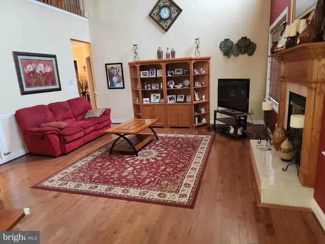 a living room with furniture or couch and a flat screen tv