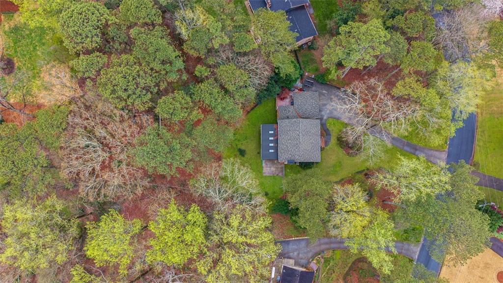 1942 Musket Court Smoke Rise, GA 30087 - Photo 3 of 54 a aerial view of a house with a yard